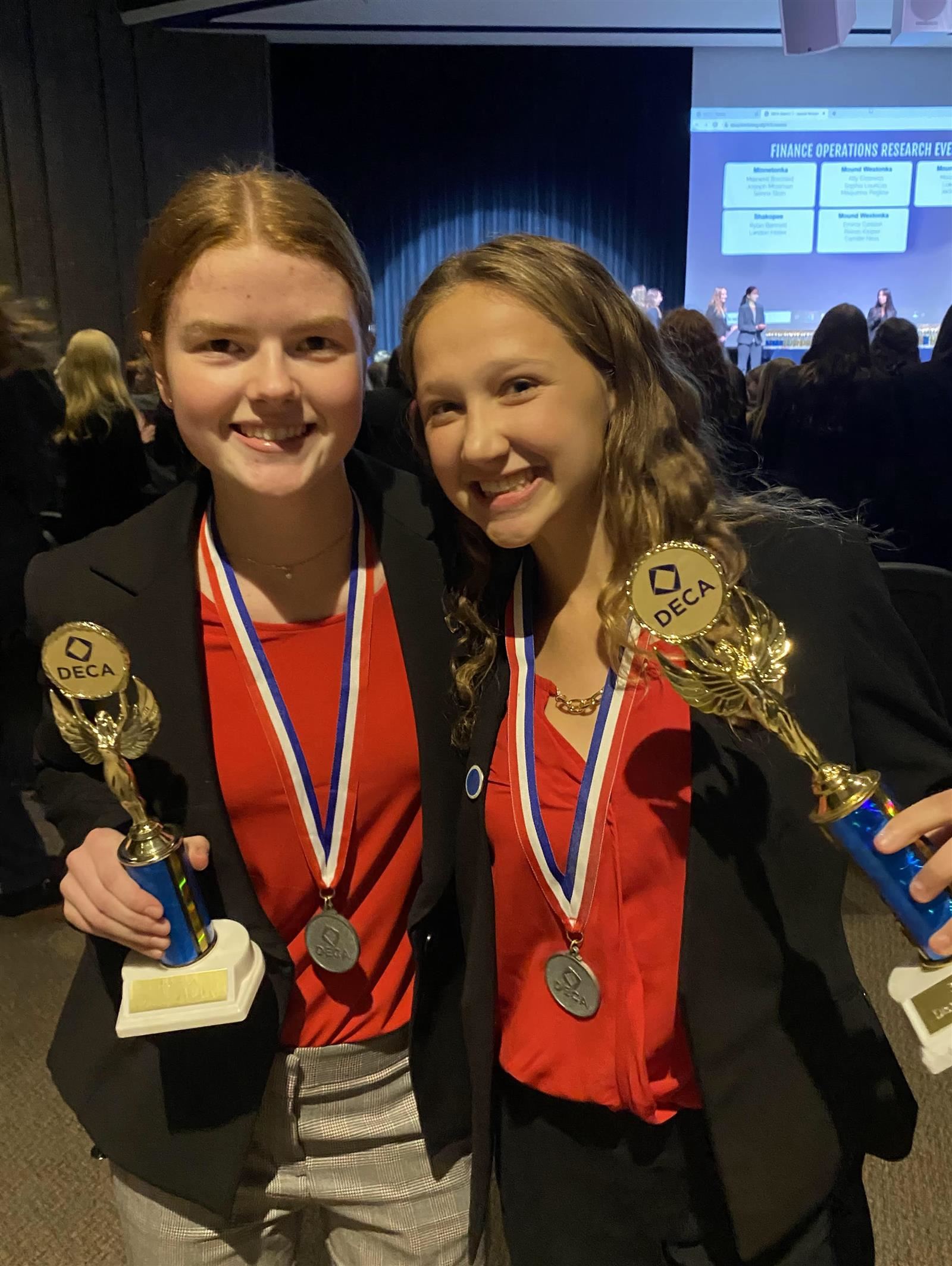 two DECA competitors