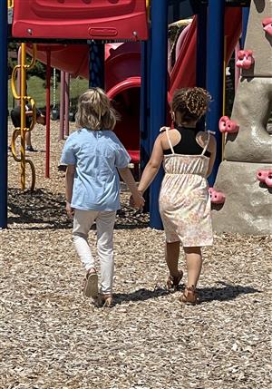 girls holding hands