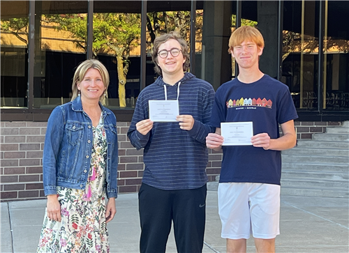  National Merit Commended Students Tor Erdahl and Jagger Wittine with Principal Herfel