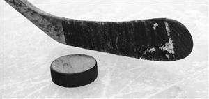 hockey stick and puck 